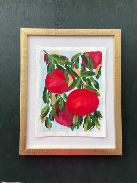 Beautiful and colorful acrylic painting on paper.  Bright reds pomegranates with shades of green and gold leaves.