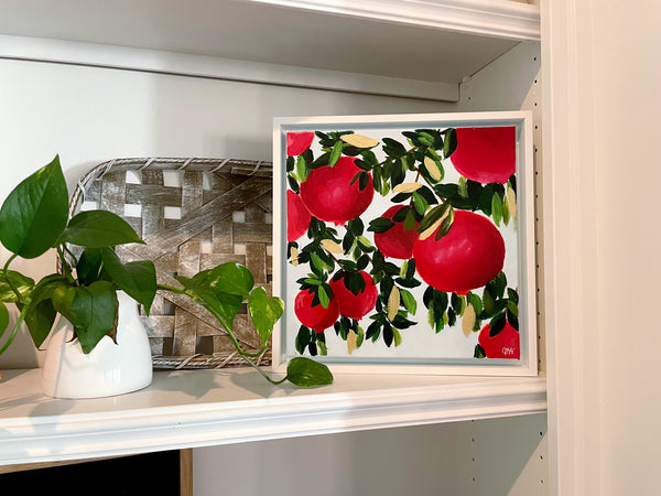 Beautiful and colorful acrylic painting on canvas.  Bright reds pomegranates with shades of green and gold leaves.